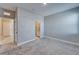 Bedroom showcasing an ensuite bathroom and a bright window at 16725 Barnwood Pl, Bradenton, FL 34211