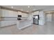 Spacious kitchen with white cabinetry, granite countertops, and stainless steel appliances at 16725 Barnwood Pl, Bradenton, FL 34211