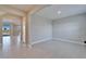 Bright living room with tile flooring, recessed lighting, and views of the water at 16725 Barnwood Pl, Bradenton, FL 34211