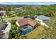 Aerial view of home, showcasing large backyard and pool area at 17112 Downs Dr, Odessa, FL 33556