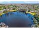 Aerial view of community lake with gazebo at 17112 Downs Dr, Odessa, FL 33556