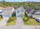 Two-story home boasts manicured landscaping, attached garage, and traditional architectural details at 20033 Heritage Point Dr, Tampa, FL 33647