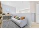 Cozy loft space with comfortable seating, built-in shelves, and a dedicated desk area for work or study at 20033 Heritage Point Dr, Tampa, FL 33647