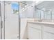 Modern main bathroom featuring a glass-enclosed shower and ample lighting for a relaxing spa feel at 20033 Heritage Point Dr, Tampa, FL 33647