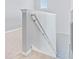 A well-lit stairwell with white railing at 20033 Heritage Point Dr, Tampa, FL 33647