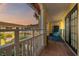 Charming outdoor balcony featuring tile floors, comfortable seating, and courtyard views for relaxation at 210 22Nd Ne Ave # 14, St Petersburg, FL 33704