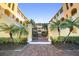 Elegant gated entrance with well-manicured landscaping adds curb appeal to the Mediterranean-style complex at 210 22Nd Ne Ave # 14, St Petersburg, FL 33704