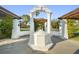 Elegant gazebo with classic architectural elements, complemented by lush landscaping and ambient lighting at 210 22Nd Ne Ave # 14, St Petersburg, FL 33704