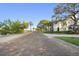 Picturesque brick street view highlighting a charming neighborhood with elegant homes and lush landscaping at 210 22Nd Ne Ave # 14, St Petersburg, FL 33704