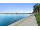 Expansive waterfront view, featuring calm waters, a scenic walkway, and a picturesque horizon for tranquil beauty at 210 22Nd Ne Ave # 14, St Petersburg, FL 33704