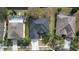 Bird's-eye view of three homes situated by a canal at 26848 Shoregrass Dr, Wesley Chapel, FL 33544