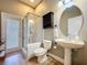 Bathroom with shower, toilet and pedestal sink at 26848 Shoregrass Dr, Wesley Chapel, FL 33544