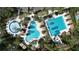 Resort-style pool area with lap pool, leisure pool, and water slide at 26848 Shoregrass Dr, Wesley Chapel, FL 33544