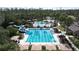 Large pool with lap lanes and adjacent leisure pool and slide at 26848 Shoregrass Dr, Wesley Chapel, FL 33544