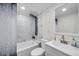 Clean bathroom, featuring a shower, bathtub, and modern vanity at 2904 Matchlock Dr, Holiday, FL 34690