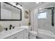 Clean bathroom, bathtub, shower, and double vanity at 2904 Matchlock Dr, Holiday, FL 34690