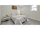 Simple bedroom with double bed and window at 2904 Matchlock Dr, Holiday, FL 34690