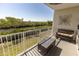 Relax on this balcony with a bench seat and table, overlooking lush mangroves and providing a tranquil outdoor experience at 3244 Mangrove Point Dr, Ruskin, FL 33570