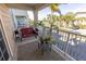 Inviting balcony features a bench, plants, outdoor rug, and views of the community at 3244 Mangrove Point Dr, Ruskin, FL 33570