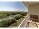 Enjoy serene mangrove views from this condo balcony, perfect for relaxation and appreciating the natural beauty of the surroundings at 3244 Mangrove Point Dr, Ruskin, FL 33570