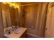 Bathroom featuring a shower-tub combination and vanity with large mirror at 3244 Mangrove Point Dr, Ruskin, FL 33570