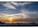 Sunset at the beach, with people enjoying the beautiful view and warm atmosphere at 3244 Mangrove Point Dr, Ruskin, FL 33570