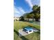 Cornhole on lush lawn with views of the community, and access to a variety of outdoor activities at 3244 Mangrove Point Dr, Ruskin, FL 33570