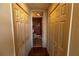 Hallway featuring dual closets and access to a stylish bathroom at 3244 Mangrove Point Dr, Ruskin, FL 33570