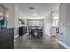 Open-concept dining area featuring modern flooring and light-filled window views at 3704 Thornwood Pl, Tampa, FL 33618