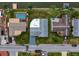 An aerial view of a single Gathering home with a backyard pool at 3832 Star Island Dr, Holiday, FL 34691