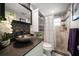 Modern bathroom featuring a vessel sink, mosaic tile backsplash, and a stylish shower at 3832 Star Island Dr, Holiday, FL 34691