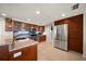 Well-equipped kitchen boasting stainless steel appliances and functional design at 3832 Star Island Dr, Holiday, FL 34691