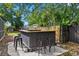 Modern outdoor bar with seating for guests at 4412 W Pearl Ave, Tampa, FL 33611