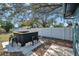 Outdoor backyard bar with seating, perfect for entertaining at 4412 W Pearl Ave, Tampa, FL 33611