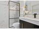 Modern bathroom with frameless shower and floating vanity at 4412 W Pearl Ave, Tampa, FL 33611