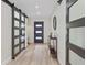 Bright entryway with modern barn doors and light wood flooring at 4412 W Pearl Ave, Tampa, FL 33611