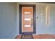 Modern front door with updated hardware and a welcome mat at 4412 W Pearl Ave, Tampa, FL 33611