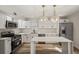 Modern kitchen featuring stainless steel appliances and an island at 4412 W Pearl Ave, Tampa, FL 33611