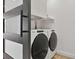 Bright laundry room with modern Whirlpool washer and dryer at 4412 W Pearl Ave, Tampa, FL 33611