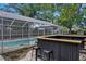 Inviting screened-in pool, ready for summer fun at 4412 W Pearl Ave, Tampa, FL 33611