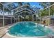 Relaxing screened pool perfect for summer days at 4412 W Pearl Ave, Tampa, FL 33611