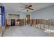 Spacious bedroom with ceiling fan needing renovation and repairs at 4440 Huntington Ne St, St Petersburg, FL 33703