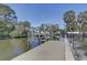 Private boat dock on the canal with a boat lift, offering direct access to the water at 4440 Huntington Ne St, St Petersburg, FL 33703