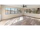 Bright sunroom with abundant windows providing natural light at 4472 Bayridge Ct, Spring Hill, FL 34606