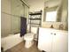 Bathroom with shower/tub combo, toilet, and vanity at 4883 Tuscan Loon Dr, Tampa, FL 33619