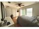 Bedroom with queen-size bed, ceiling fan and access to balcony at 4883 Tuscan Loon Dr, Tampa, FL 33619