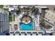 Luxury high-rise building with a resort-style pool and surrounding amenities at 5120 Marina Way # 14002, Tampa, FL 33611