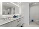 Elegant bathroom with double vanity, large mirror, and soaking tub at 5120 Marina Way # 14002, Tampa, FL 33611