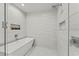 Spa-like bathroom with walk-in shower and soaking tub at 5120 Marina Way # 14002, Tampa, FL 33611