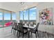 Modern dining room with water views and stylish light fixture at 5120 Marina Way # 14002, Tampa, FL 33611